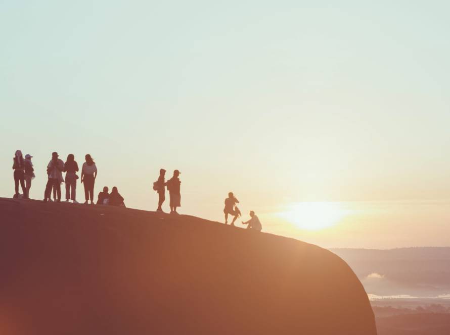 silhouette picture of people on mountain peak rock 2024 12 06 05 44 47 utc