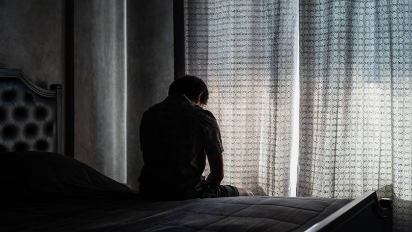 lonely young man depressed and stressed sitting in 2025 03 07 00 53 07 utc